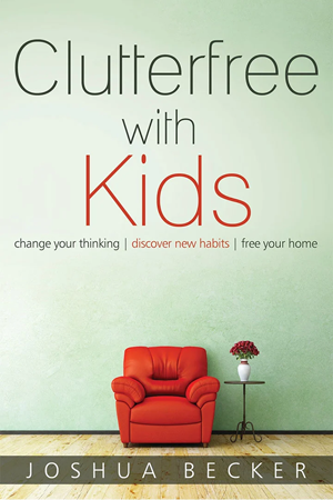 Clutterfree with Kids book cover has the title in black lettering against an image of a forward facing red chair and coffee table with a vase on top in front of a light green wall.