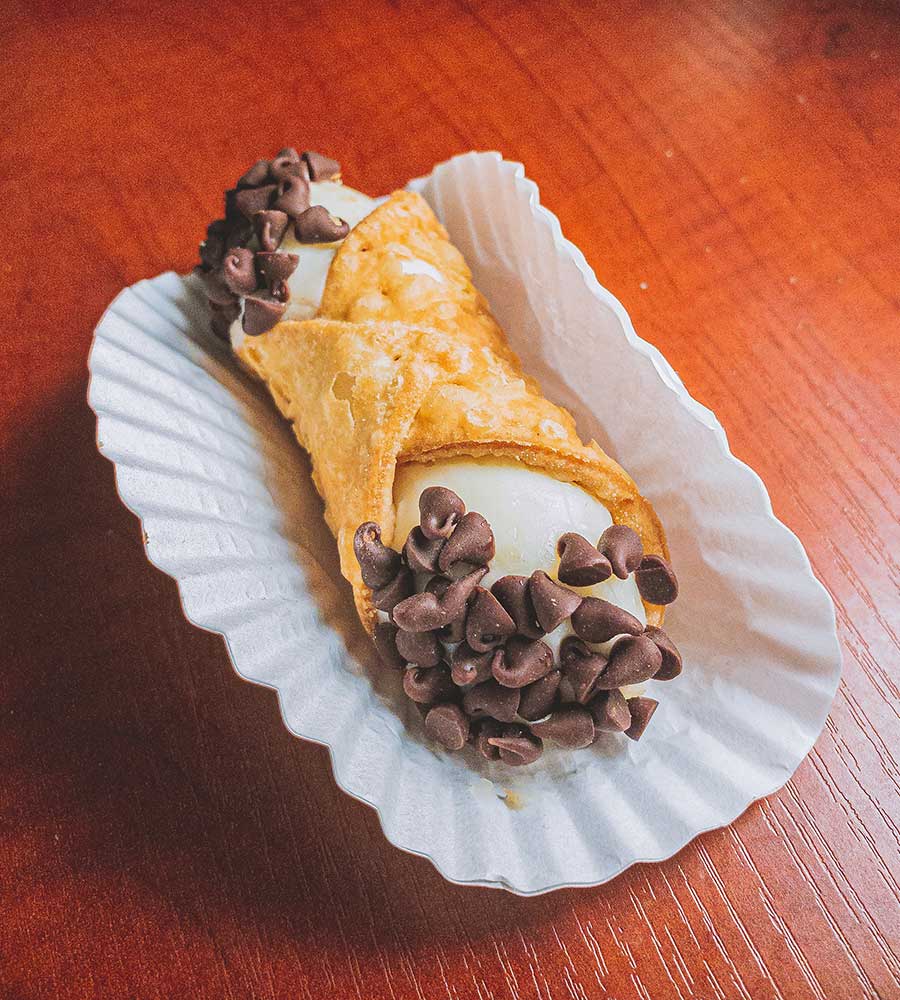 connoli with chocolate chips on each end.